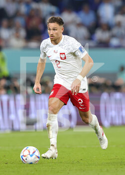 2022-11-30 - Matty Cash of Poland during the FIFA World Cup 2022, Group C football match between Poland and Argentina on November 30, 2022 at Stadium 974 in Doha, Qatar - FOOTBALL - WORLD CUP 2022 - POLAND V ARGENTINA - FIFA WORLD CUP - SOCCER