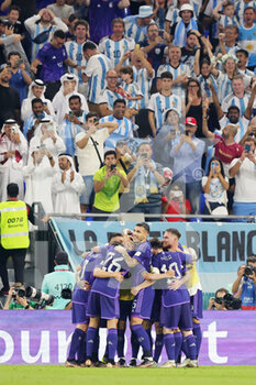 2022-11-30 - Julian Alvarez of Argentina celebrates his goal 0-2 with teammates during the FIFA World Cup 2022, Group C football match between Poland and Argentina on November 30, 2022 at Stadium 974 in Doha, Qatar - FOOTBALL - WORLD CUP 2022 - POLAND V ARGENTINA - FIFA WORLD CUP - SOCCER