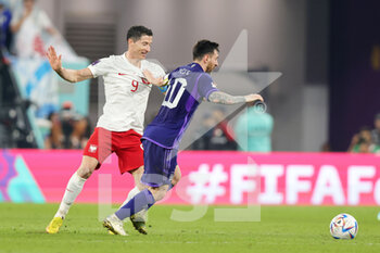 2022-11-30 - Lionel Messi of Argentina and Robert Lewandowski of Poland during the FIFA World Cup 2022, Group C football match between Poland and Argentina on November 30, 2022 at Stadium 974 in Doha, Qatar - FOOTBALL - WORLD CUP 2022 - POLAND V ARGENTINA - FIFA WORLD CUP - SOCCER