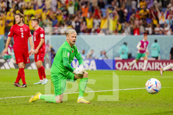 2022-12-01 - Goal Kasper Schmeichel (1) of Denmark reacts to seeing the ball go past him during the FIFA World Cup 2022, Group D football match between Australia and Denmark on November 30, 2022 at Al-Janoub Stadium in Al-Wakrah, Qatar - FOOTBALL - WORLD CUP 2022 - AUSTRALIA V DENMARK - FIFA WORLD CUP - SOCCER