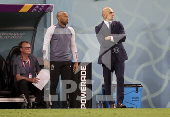2022-12-01 - Coach of Belgium Roberto Martinez, assistant-coach of Belgium Thierry Henry (left) during the FIFA World Cup 2022, Group F football match between Croatia and Belgium on December 1, 2022 at Ahmad Bin Ali Stadium in Ar-Rayyan, Qatar - FOOTBALL - WORLD CUP 2022 - CROATIA V BELGIUM - FIFA WORLD CUP - SOCCER