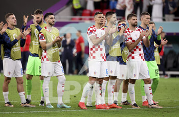 2022-12-01 - Dejan Lovren of Croatia and teammates celebrate the victory with the fans following the FIFA World Cup 2022, Group F football match between Croatia and Belgium on December 1, 2022 at Ahmad Bin Ali Stadium in Ar-Rayyan, Qatar - FOOTBALL - WORLD CUP 2022 - CROATIA V BELGIUM - FIFA WORLD CUP - SOCCER