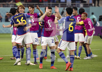 2022-12-01 - Shuto Machino of Japan and teammates celebrate the victory following the FIFA World Cup 2022, Group E football match between Japan and Spain on December 1, 2022 at Khalifa International Stadium in Ar-Rayyan, Qatar - FOOTBALL - WORLD CUP 2022 - JAPAN V SPAIN - FIFA WORLD CUP - SOCCER