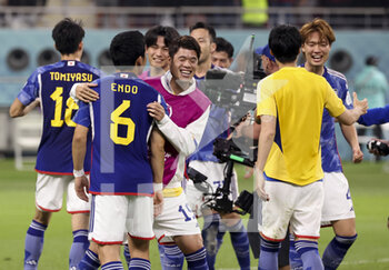 2022-12-01 - Hiroki Sakai of Japan and teammates celebrate the victory following the FIFA World Cup 2022, Group E football match between Japan and Spain on December 1, 2022 at Khalifa International Stadium in Ar-Rayyan, Qatar - FOOTBALL - WORLD CUP 2022 - JAPAN V SPAIN - FIFA WORLD CUP - SOCCER