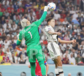 2022-12-01 - Keylor Navas of Costa Rica, Jamal Musiala of Germany during the FIFA World Cup 2022, Group E football match between Costa Rica and Germany on December 1, 2022 at Al Bayt Stadium in Al Khor, Qatar - FOOTBALL - WORLD CUP 2022 - COSTA RICA V GERMANY - FIFA WORLD CUP - SOCCER