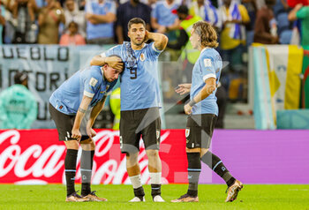 2022-12-02 - Uruguay players look devastated at full time during the FIFA World Cup 2022, Group H football match between Ghana and Uruguay on December 2, 2022 at Al-Janoub Stadium in Al-Wakrah, Qatar - FOOTBALL - WORLD CUP 2022 - GHANA V URUGUAY - FIFA WORLD CUP - SOCCER