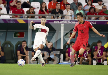 2022-12-02 - Joao Cancelo of Portugal, Lee Jae-Song of South Korea during the FIFA World Cup 2022, Group H football match between Korea Republic and Portugal on December 2, 2022 at Education City Stadium in Doha, Qatar - FOOTBALL - WORLD CUP 2022 - KOREA REPUBLIC V PORTUGAL - FIFA WORLD CUP - SOCCER