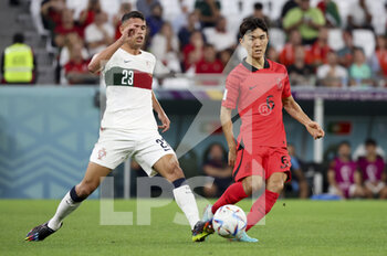 2022-12-02 - Matheus Nunes of Portugal, Hwang In-Beom of South Korea during the FIFA World Cup 2022, Group H football match between Korea Republic and Portugal on December 2, 2022 at Education City Stadium in Doha, Qatar - FOOTBALL - WORLD CUP 2022 - KOREA REPUBLIC V PORTUGAL - FIFA WORLD CUP - SOCCER