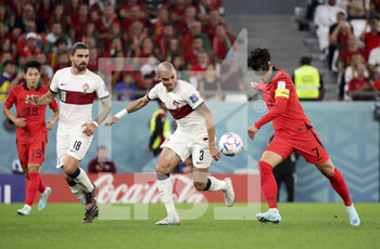 2022-12-02 - Son Heung-Min of South Korea, left Pepe, Ruben Neves of Portugal during the FIFA World Cup 2022, Group H football match between Korea Republic and Portugal on December 2, 2022 at Education City Stadium in Doha, Qatar - FOOTBALL - WORLD CUP 2022 - KOREA REPUBLIC V PORTUGAL - FIFA WORLD CUP - SOCCER
