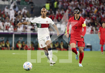 2022-12-02 - Joao Mario of Portugal, Son Heung-Min of South Korea during the FIFA World Cup 2022, Group H football match between Korea Republic and Portugal on December 2, 2022 at Education City Stadium in Doha, Qatar - FOOTBALL - WORLD CUP 2022 - KOREA REPUBLIC V PORTUGAL - FIFA WORLD CUP - SOCCER