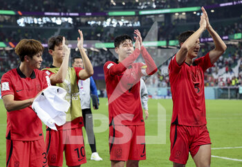 2022-12-02 - Son Heung-Min, Jung Woo-Young of South Korea and teammates celebrate the victory following the FIFA World Cup 2022, Group H football match between Korea Republic and Portugal on December 2, 2022 at Education City Stadium in Doha, Qatar - FOOTBALL - WORLD CUP 2022 - KOREA REPUBLIC V PORTUGAL - FIFA WORLD CUP - SOCCER