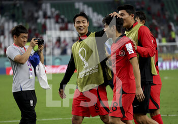 2022-12-02 - Paik Seung-Ho, Lee Kang-In of South Korea celebrate the victory following the FIFA World Cup 2022, Group H football match between Korea Republic and Portugal on December 2, 2022 at Education City Stadium in Doha, Qatar - FOOTBALL - WORLD CUP 2022 - KOREA REPUBLIC V PORTUGAL - FIFA WORLD CUP - SOCCER