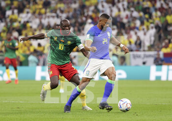 2022-12-02 - Gleison Bremer Silva Nascimento of Brazil, Vincent Aboubakar of Cameroon (left) during the FIFA World Cup 2022, Group G football match between Cameroon and Brazil on December 2, 2022 at Lusail Stadium in Al Daayen, Qatar - FOOTBALL - WORLD CUP 2022 - CAMEROON V BRAZIL - FIFA WORLD CUP - SOCCER