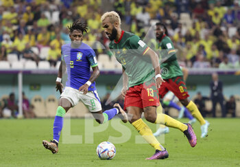 2022-12-02 - Eric Maxim Choupo-Moting of Cameroon, Frederico Rodrigues de Paula aka Fred of Brazil (left) during the FIFA World Cup 2022, Group G football match between Cameroon and Brazil on December 2, 2022 at Lusail Stadium in Al Daayen, Qatar - FOOTBALL - WORLD CUP 2022 - CAMEROON V BRAZIL - FIFA WORLD CUP - SOCCER