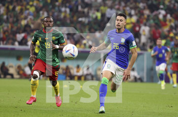 2022-12-02 - Gabriel Martinelli of Brazil, Collins Fai of Cameroon (left) during the FIFA World Cup 2022, Group G football match between Cameroon and Brazil on December 2, 2022 at Lusail Stadium in Al Daayen, Qatar - FOOTBALL - WORLD CUP 2022 - CAMEROON V BRAZIL - FIFA WORLD CUP - SOCCER