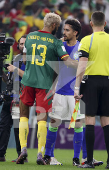 2022-12-02 - Marquinhos of Brazil salutes former PSG teammates Eric Maxim Choupo-Moting of Cameroon following the FIFA World Cup 2022, Group G football match between Cameroon and Brazil on December 2, 2022 at Lusail Stadium in Al Daayen, Qatar - FOOTBALL - WORLD CUP 2022 - CAMEROON V BRAZIL - FIFA WORLD CUP - SOCCER