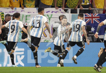 2022-12-03 - Lionel Messi of Argentina celebrates his goal with teammates during the FIFA World Cup 2022, Round of 16 football match between Argentina and Australia on December 3, 2022 at Ahmad Bin Ali Stadium in Al Rayyan, Qatar - FOOTBALL - WORLD CUP 2022 - 1/8 - ARGENTINA V AUSTRALIA - FIFA WORLD CUP - SOCCER