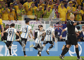 2022-12-03 - Lionel Messi of Argentina celebrates his goal with teammates during the FIFA World Cup 2022, Round of 16 football match between Argentina and Australia on December 3, 2022 at Ahmad Bin Ali Stadium in Al Rayyan, Qatar - FOOTBALL - WORLD CUP 2022 - 1/8 - ARGENTINA V AUSTRALIA - FIFA WORLD CUP - SOCCER