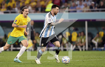 2022-12-03 - Lionel Messi of Argentina, Jackson Irvine of Australia (left) during the FIFA World Cup 2022, Round of 16 football match between Argentina and Australia on December 3, 2022 at Ahmad Bin Ali Stadium in Al Rayyan, Qatar - FOOTBALL - WORLD CUP 2022 - 1/8 - ARGENTINA V AUSTRALIA - FIFA WORLD CUP - SOCCER