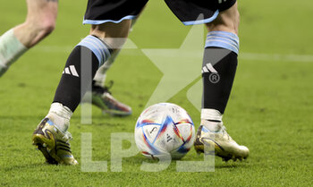 2022-12-03 - Adidas official matchball, Adidas boots of Lionel Messi of Argentina during the FIFA World Cup 2022, Round of 16 football match between Argentina and Australia on December 3, 2022 at Ahmad Bin Ali Stadium in Al Rayyan, Qatar - FOOTBALL - WORLD CUP 2022 - 1/8 - ARGENTINA V AUSTRALIA - FIFA WORLD CUP - SOCCER