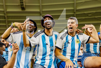 2022-12-04 - Argentina fans during the FIFA World Cup 2022, Round of 16 football match between Argentina and Australia on December 3, 2022 at Ahmad Bin Ali Stadium in Al Rayyan, Qatar - FOOTBALL - WORLD CUP 2022 - 1/8 - ARGENTINA V AUSTRALIA - FIFA WORLD CUP - SOCCER
