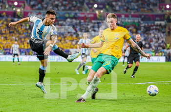 2022-12-04 - Lautaro Martinez (22) of Argentina, Harry Souttar of Australia during the FIFA World Cup 2022, Round of 16 football match between Argentina and Australia on December 3, 2022 at Ahmad Bin Ali Stadium in Al Rayyan, Qatar - FOOTBALL - WORLD CUP 2022 - 1/8 - ARGENTINA V AUSTRALIA - FIFA WORLD CUP - SOCCER