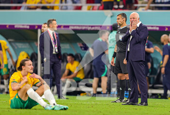 2022-12-04 - Graham Arnold Manager of Australia looks dejected at full time during the FIFA World Cup 2022, Round of 16 football match between Argentina and Australia on December 3, 2022 at Ahmad Bin Ali Stadium in Al Rayyan, Qatar - FOOTBALL - WORLD CUP 2022 - 1/8 - ARGENTINA V AUSTRALIA - FIFA WORLD CUP - SOCCER