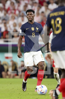 2022-12-04 - Aurelien Tchouameni of France during the FIFA World Cup 2022, Round of 16 football match between France and Poland on December 4, 2022 at Al Thumama Stadium in Doha, Qatar - FOOTBALL - WORLD CUP 2022 - 1/8 - FRANCE V POLAND - FIFA WORLD CUP - SOCCER