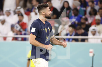 2022-12-04 - Olivier Giroud of France celebrates his goal during the FIFA World Cup 2022, Round of 16 football match between France and Poland on December 4, 2022 at Al Thumama Stadium in Doha, Qatar - FOOTBALL - WORLD CUP 2022 - 1/8 - FRANCE V POLAND - FIFA WORLD CUP - SOCCER