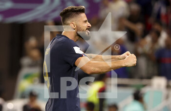 2022-12-04 - Olivier Giroud of France celebrates the goal of Kylian Mbappe during the FIFA World Cup 2022, Round of 16 football match between France and Poland on December 4, 2022 at Al Thumama Stadium in Doha, Qatar - FOOTBALL - WORLD CUP 2022 - 1/8 - FRANCE V POLAND - FIFA WORLD CUP - SOCCER
