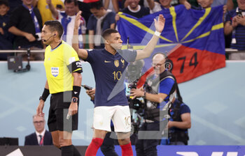2022-12-04 - Kylian Mbappe of France celebrates his first goal during the FIFA World Cup 2022, Round of 16 football match between France and Poland on December 4, 2022 at Al Thumama Stadium in Doha, Qatar - FOOTBALL - WORLD CUP 2022 - 1/8 - FRANCE V POLAND - FIFA WORLD CUP - SOCCER