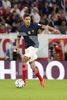 2022-12-04 - Raphael Varane of France during the FIFA World Cup 2022, Round of 16 football match between France and Poland on December 4, 2022 at Al Thumama Stadium in Doha, Qatar - FOOTBALL - WORLD CUP 2022 - 1/8 - FRANCE V POLAND - FIFA WORLD CUP - SOCCER