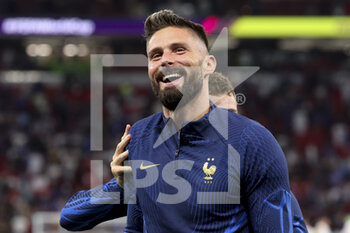 2022-12-04 - Olivier Giroud of France celebrates the victory following the FIFA World Cup 2022, Round of 16 football match between France and Poland on December 4, 2022 at Al Thumama Stadium in Doha, Qatar - FOOTBALL - WORLD CUP 2022 - 1/8 - FRANCE V POLAND - FIFA WORLD CUP - SOCCER
