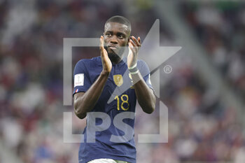 2022-12-04 - Dayot Upamecano of France during the FIFA World Cup 2022, Round of 16 football match between France and Poland on December 4, 2022 at Al Thumama Stadium in Doha, Qatar - FOOTBALL - WORLD CUP 2022 - 1/8 - FRANCE V POLAND - FIFA WORLD CUP - SOCCER