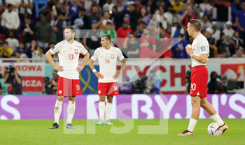 2022-12-04 - Grzegorz Krychowiak of Poland looks dejected after the France's 1-0 goal during the FIFA World Cup 2022, Round of 16 football match between France and Poland on December 4, 2022 at Al Thumama Stadium in Doha, Qatar - FOOTBALL - WORLD CUP 2022 - 1/8 - FRANCE V POLAND - FIFA WORLD CUP - SOCCER