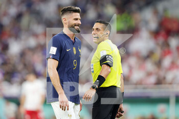 2022-12-04 - Olivier Giroud of France, Referee Jesus Valenzuela during the FIFA World Cup 2022, Round of 16 football match between France and Poland on December 4, 2022 at Al Thumama Stadium in Doha, Qatar - FOOTBALL - WORLD CUP 2022 - 1/8 - FRANCE V POLAND - FIFA WORLD CUP - SOCCER
