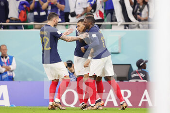 2022-12-04 - Kylian Mbappe of France celebrates his goal 2-0 with team mates during the FIFA World Cup 2022, Round of 16 football match between France and Poland on December 4, 2022 at Al Thumama Stadium in Doha, Qatar - FOOTBALL - WORLD CUP 2022 - 1/8 - FRANCE V POLAND - FIFA WORLD CUP - SOCCER