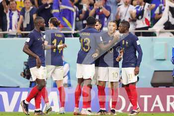 2022-12-04 - Kylian Mbappe of France celebrates his goal 2-0 with team mates during the FIFA World Cup 2022, Round of 16 football match between France and Poland on December 4, 2022 at Al Thumama Stadium in Doha, Qatar - FOOTBALL - WORLD CUP 2022 - 1/8 - FRANCE V POLAND - FIFA WORLD CUP - SOCCER
