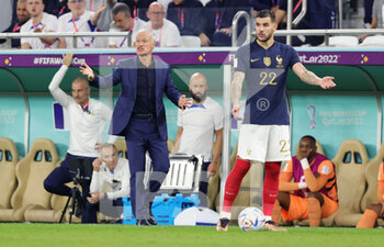 2022-12-04 - Head coach Didier Deschamps and Theo Hernandez of France during the FIFA World Cup 2022, Round of 16 football match between France and Poland on December 4, 2022 at Al Thumama Stadium in Doha, Qatar - FOOTBALL - WORLD CUP 2022 - 1/8 - FRANCE V POLAND - FIFA WORLD CUP - SOCCER