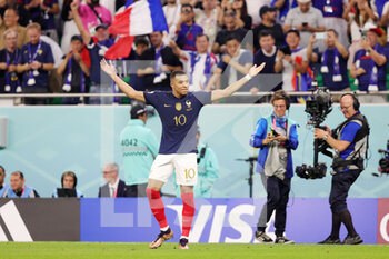 2022-12-04 - Kylian Mbappe of France celebrates his goal 3-0 during the FIFA World Cup 2022, Round of 16 football match between France and Poland on December 4, 2022 at Al Thumama Stadium in Doha, Qatar - FOOTBALL - WORLD CUP 2022 - 1/8 - FRANCE V POLAND - FIFA WORLD CUP - SOCCER