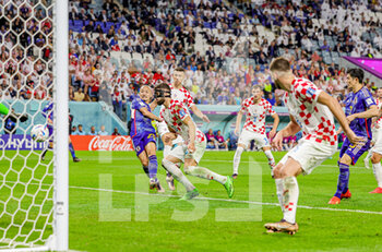 2022-12-05 - Daizen Maeda (25) of Japan scores a goal 1-0 during the FIFA World Cup 2022, Round of 16 football match between Japan and Croatia on December 5, 2022 at Al-Janoub Stadium in Al-Wakrah, Qatar - FOOTBALL - WORLD CUP 2022 - 1/8 - JAPAN V CROATIA - FIFA WORLD CUP - SOCCER