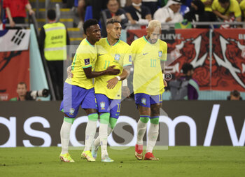 2022-12-05 - Rodrygo Silva de Goes of Brazil celebrates his goal with Raphinha, Neymar Jr during the FIFA World Cup 2022, Round of 16 football match between Brazil and Korea Republic on December 5, 2022 at Stadium 974 in Doha, Qatar - FOOTBALL - WORLD CUP 2022 - 1/8 - BRAZIL V KOREA REPUBLIC - FIFA WORLD CUP - SOCCER
