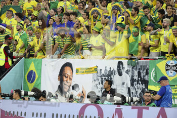 2022-12-05 - Banners from supporters showing support for Brazilian football legend Pele during the FIFA World Cup 2022, Round of 16 football match between Brazil and Korea Republic on December 5, 2022 at Stadium 974 in Doha, Qatar - FOOTBALL - WORLD CUP 2022 - 1/8 - BRAZIL V KOREA REPUBLIC - FIFA WORLD CUP - SOCCER