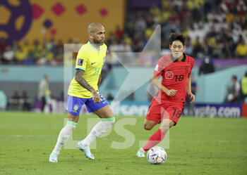2022-12-05 - Dani Alves of Brazil, Lee Kang-In of South Korea during the FIFA World Cup 2022, Round of 16 football match between Brazil and Korea Republic on December 5, 2022 at Stadium 974 in Doha, Qatar - FOOTBALL - WORLD CUP 2022 - 1/8 - BRAZIL V KOREA REPUBLIC - FIFA WORLD CUP - SOCCER