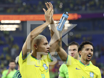 2022-12-05 - Richarlison de Andrade, Marquinhos of Brazil celebrate the victory following the FIFA World Cup 2022, Round of 16 football match between Brazil and Korea Republic on December 5, 2022 at Stadium 974 in Doha, Qatar - FOOTBALL - WORLD CUP 2022 - 1/8 - BRAZIL V KOREA REPUBLIC - FIFA WORLD CUP - SOCCER