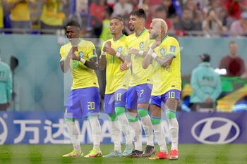 2022-12-05 - Vinicius Junior, Raphinha, Lucas Paqueta, Neymar of Brazil celebrate the 2-0 goal during the FIFA World Cup 2022, Round of 16 football match between Brazil and Korea Republic on December 5, 2022 at Stadium 974 in Doha, Qatar - FOOTBALL - WORLD CUP 2022 - 1/8 - BRAZIL V KOREA REPUBLIC - FIFA WORLD CUP - SOCCER