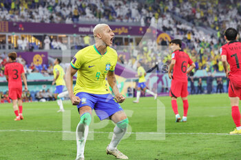 2022-12-05 - Richarlison of Brazil celebrates during the FIFA World Cup 2022, Round of 16 football match between Brazil and Korea Republic on December 5, 2022 at Stadium 974 in Doha, Qatar - FOOTBALL - WORLD CUP 2022 - 1/8 - BRAZIL V KOREA REPUBLIC - FIFA WORLD CUP - SOCCER