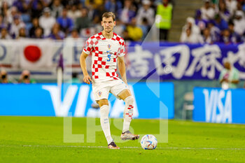 2022-12-06 - Borna Barisic (3) of Croatia during the FIFA World Cup 2022, Round of 16 football match between Japan and Croatia on December 5, 2022 at Al-Janoub Stadium in Al-Wakrah, Qatar - FOOTBALL - WORLD CUP 2022 - 1/8 - JAPAN V CROATIA - FIFA WORLD CUP - SOCCER