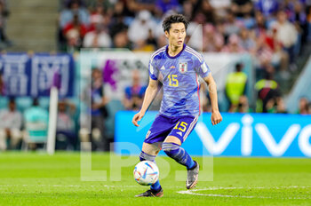 2022-12-06 - Daichi Kamada (15) of Japan during the FIFA World Cup 2022, Round of 16 football match between Japan and Croatia on December 5, 2022 at Al-Janoub Stadium in Al-Wakrah, Qatar - FOOTBALL - WORLD CUP 2022 - 1/8 - JAPAN V CROATIA - FIFA WORLD CUP - SOCCER