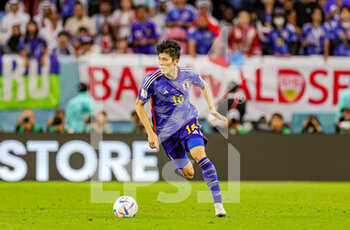 2022-12-06 - Takehiro Tomiyasu (16) of Japan during the FIFA World Cup 2022, Round of 16 football match between Japan and Croatia on December 5, 2022 at Al-Janoub Stadium in Al-Wakrah, Qatar - FOOTBALL - WORLD CUP 2022 - 1/8 - JAPAN V CROATIA - FIFA WORLD CUP - SOCCER